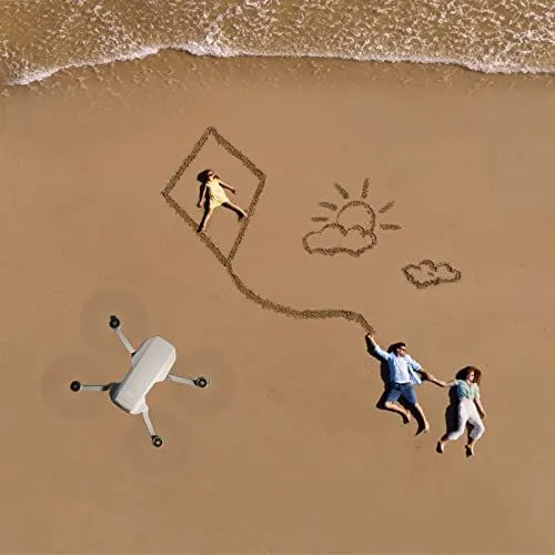 A creative drone perspective of a family on the beach