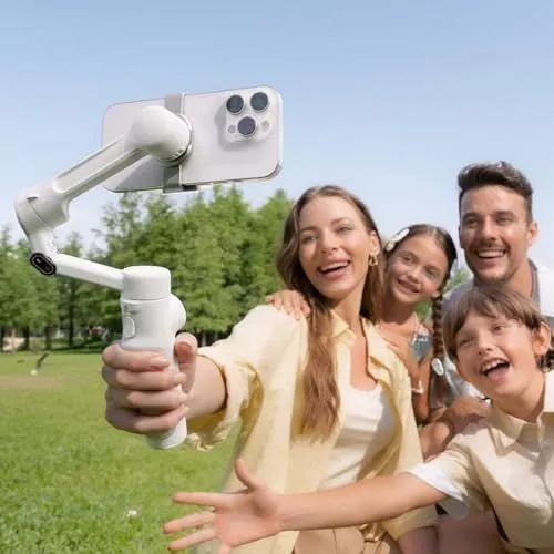 A family taking a selfie with a smartphone gimbal