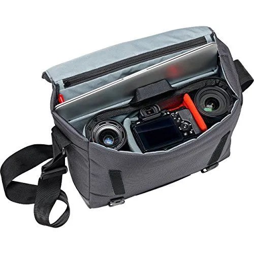 A gray camera messenger bag filled with photography gear