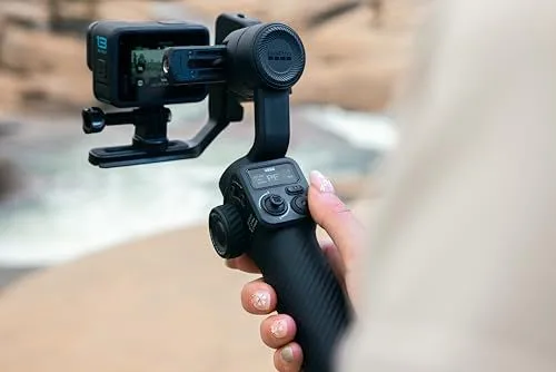 A handheld gimbal stabilizer holding a GoPro action camera