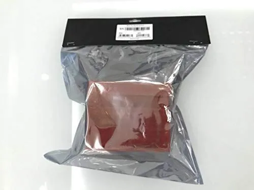 A packaged reddish brown block in a silver anti static bag