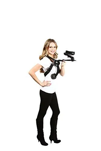 A woman wearing a professional body-mounted camera stabilizer rig
