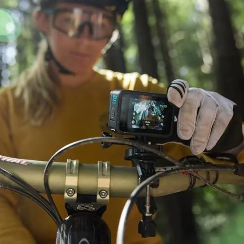 Action camera mounted on mountain bike handlebars