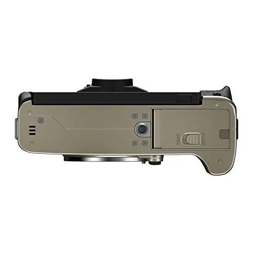 Bottom view of a champagne gold mirrorless camera