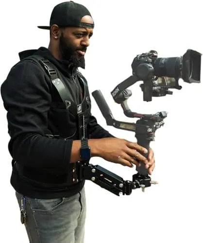 Cinematographer Operating a Professional Camera Stabilizer System