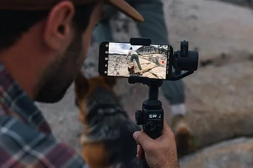 Man filming with a gimbal stabilizer