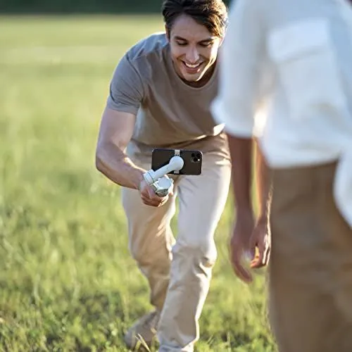 Man filming with smartphone gimbal
