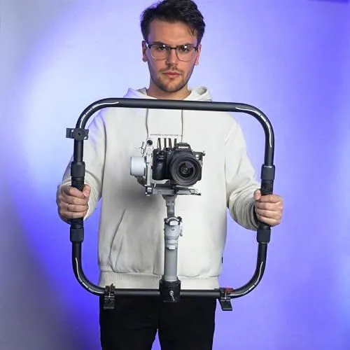 Man holding a professional camera stabilizer ring