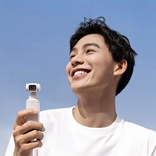 Man Holding Pocket Gimbal Camera