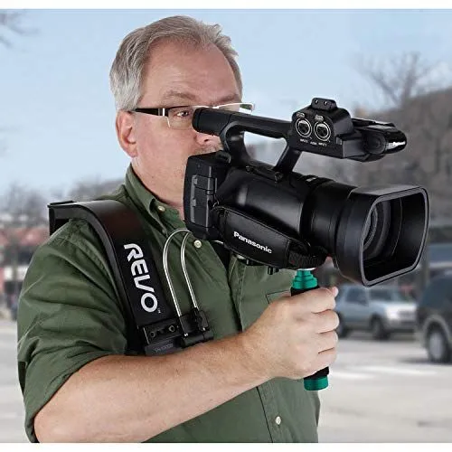 Man Operating a Panasonic Camcorder with a Revo Shoulder Support Rig