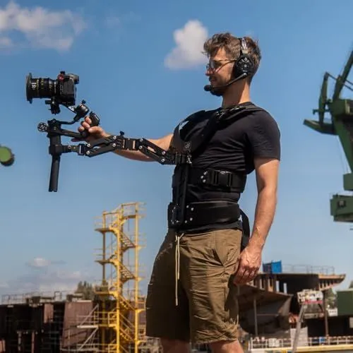Man Operating Stabilized Camera Rig