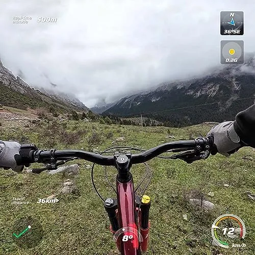 Point of view mountain biking through a foggy valley
