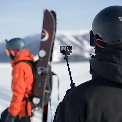 Skiers and Action Camera in the Snow